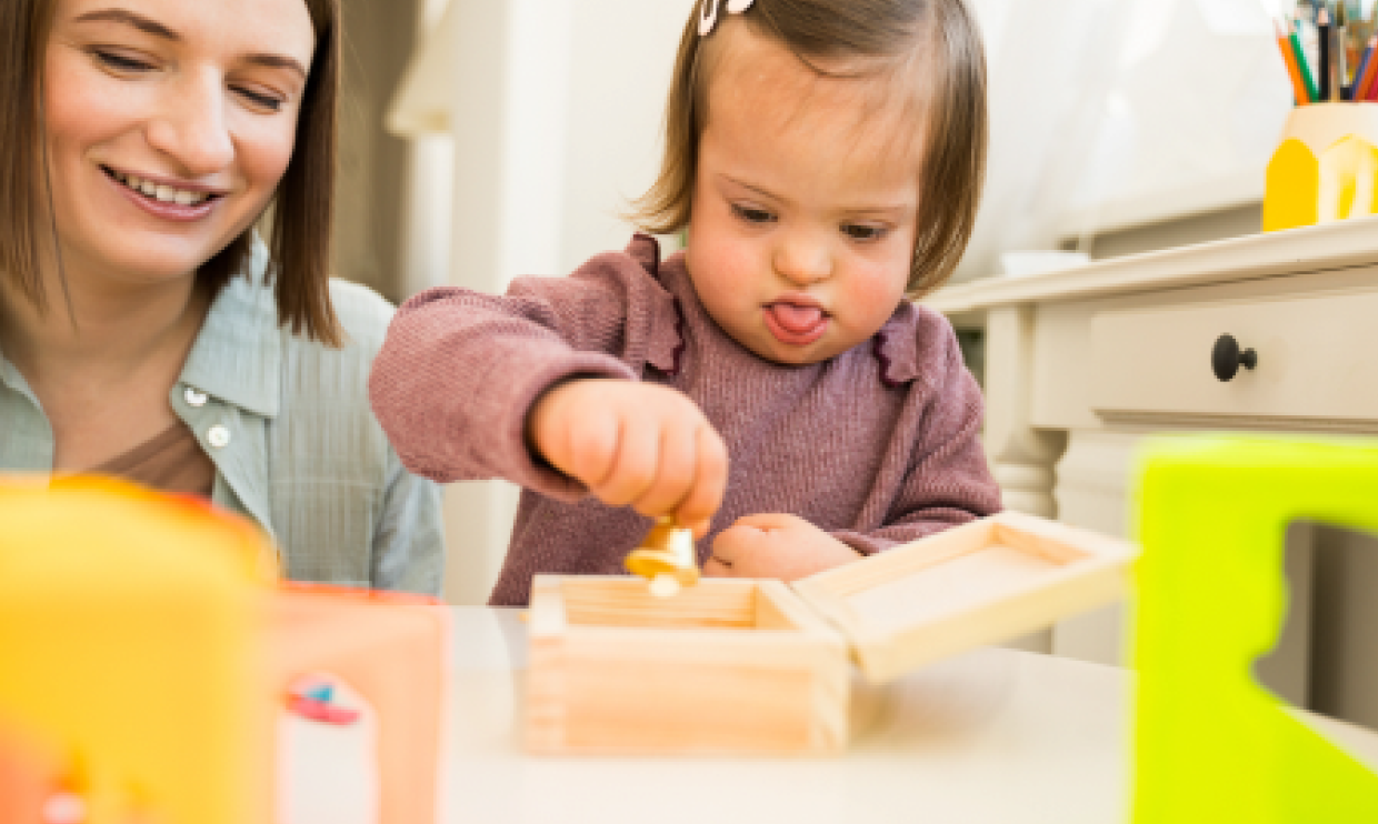 Toddler playing with toys