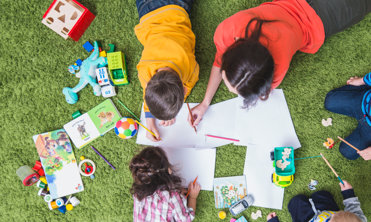 Family drawing outside