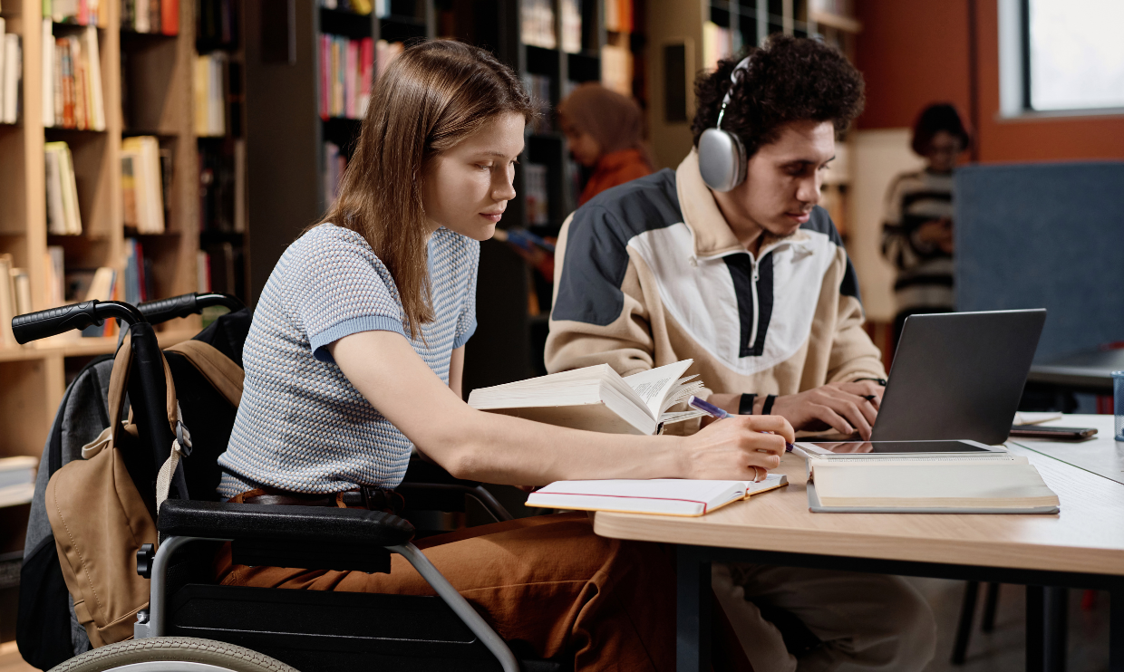 Student in a wheelchair studying