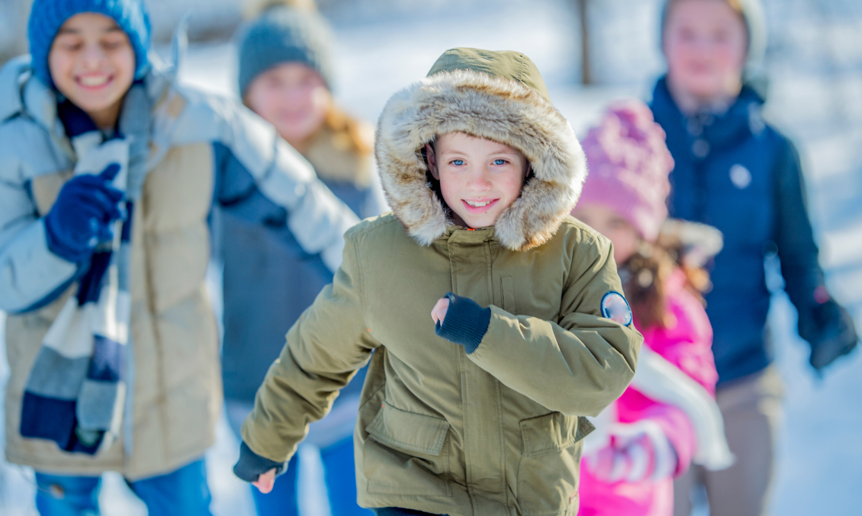 children in winter clothes playing